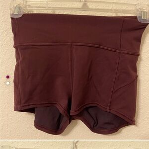 Lululemon In Movement burgundy shorts, the Beverly’s 2.5” version